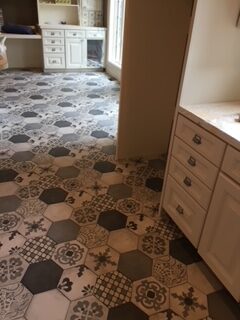 Beautiful new tile floor in the laundry room