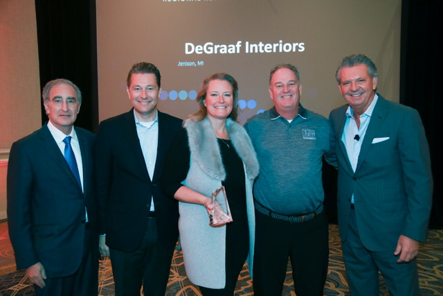 DeGraaf accepting the Mohawk Regional Retailer of the Year Award