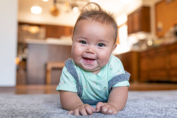 Baby On Carpet | DeGraaf Interiors