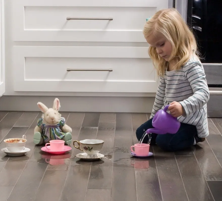 Girl Playing on Flooring | DeGraaf Interiors