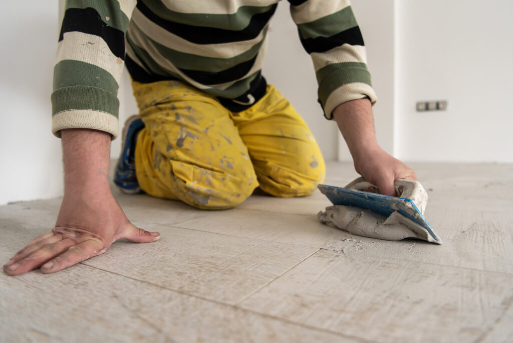 Light wood-look tile flooring with professional grout installation