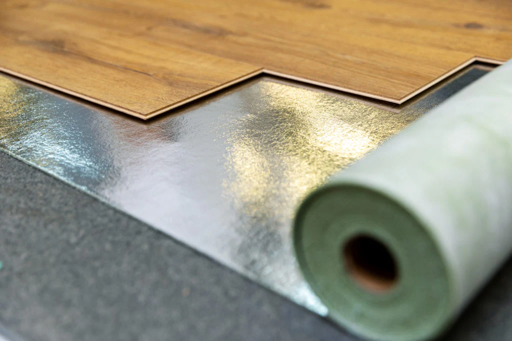 Wood-look laminate flooring with underlayment for added floor protection
