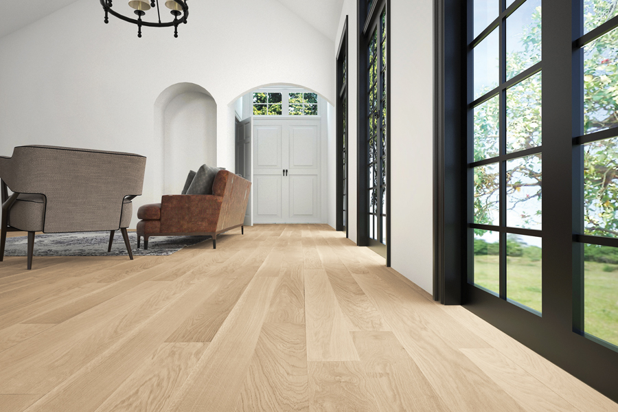 Light oak hardwood flooring in a modern open concept living room