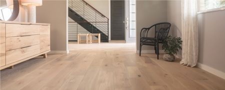 Staircase and flooring with a seamless transition between spaces | DeGraaf Interiors